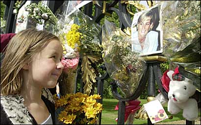 Pippa Bensley prepares a flower display (PA)